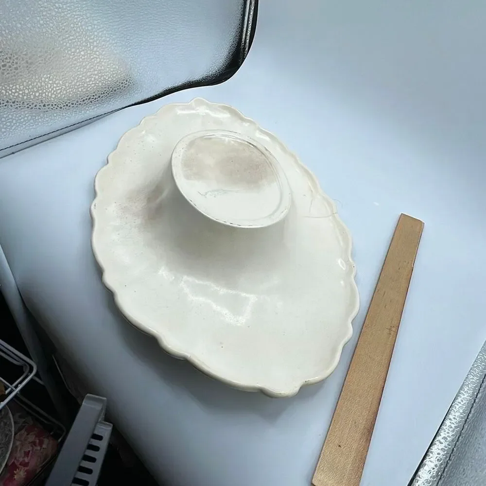 Red Wing pottery embossed cream defect